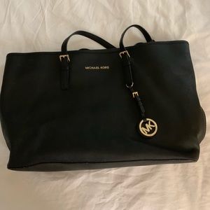 Black bag from Michael  Kors.